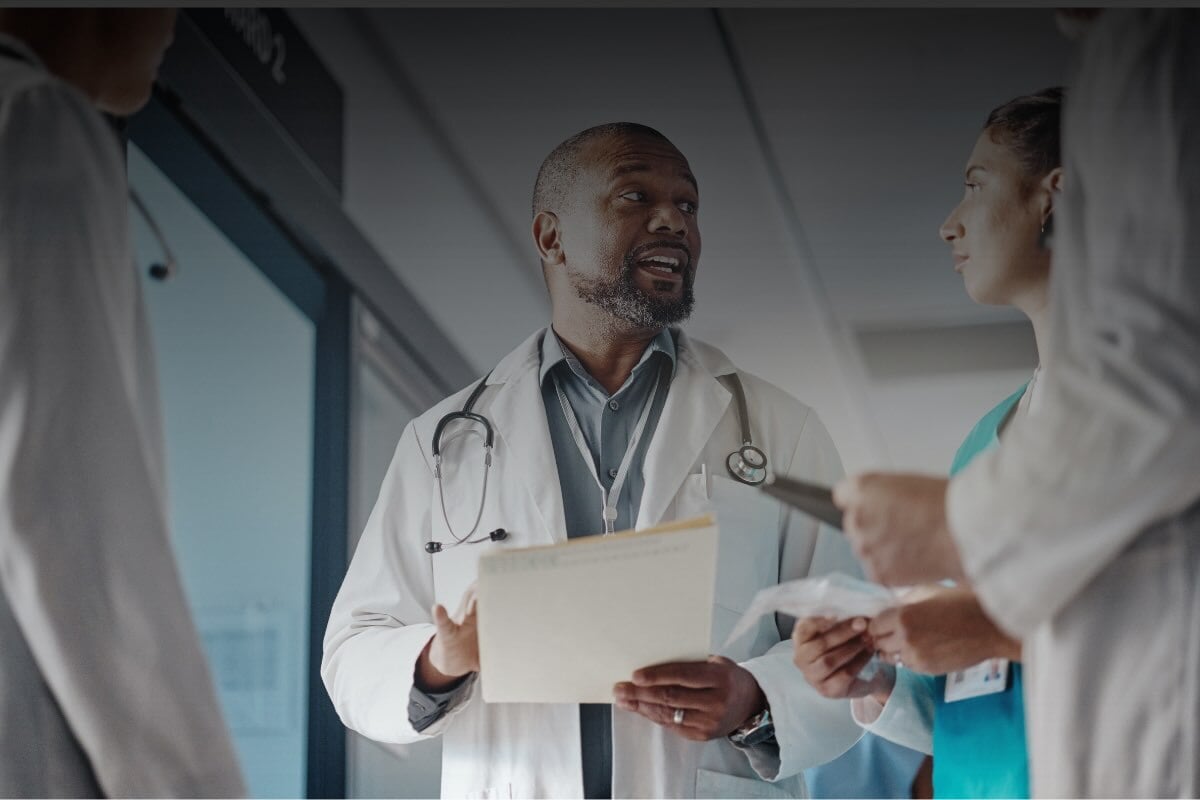 Physician meeting at hospital for acute care patient 