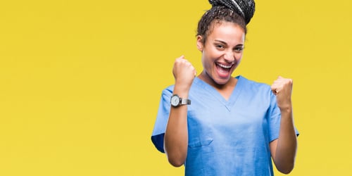 happy nurse in a light blue uniform