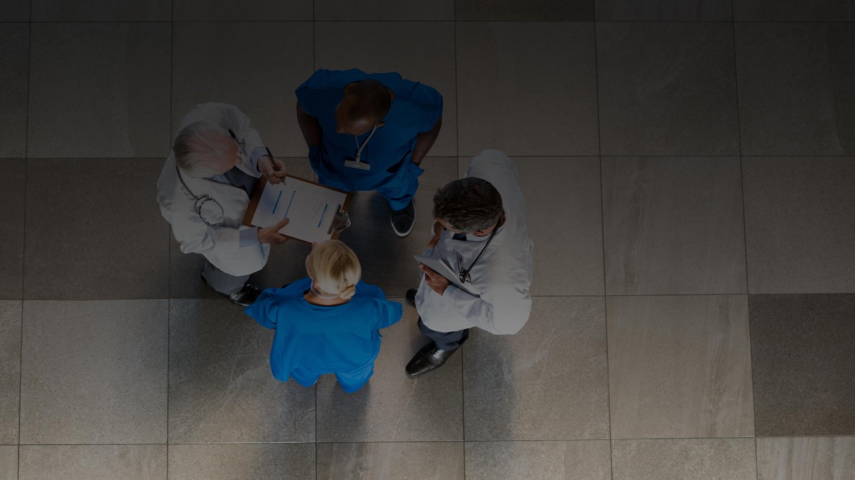 Team of doctors and nurses providing patient care in EHR 